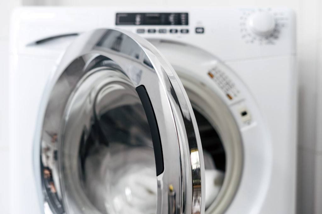 new clothes dryer with open door, closeup