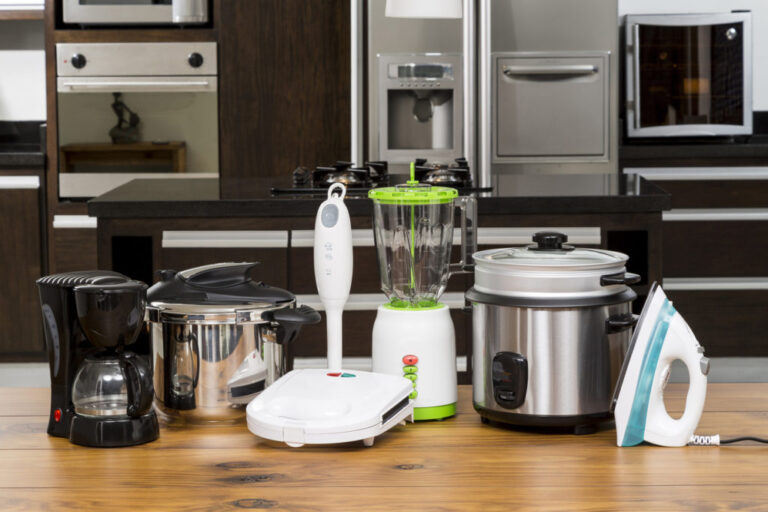 small kitchen appliances on an island in a kitchen