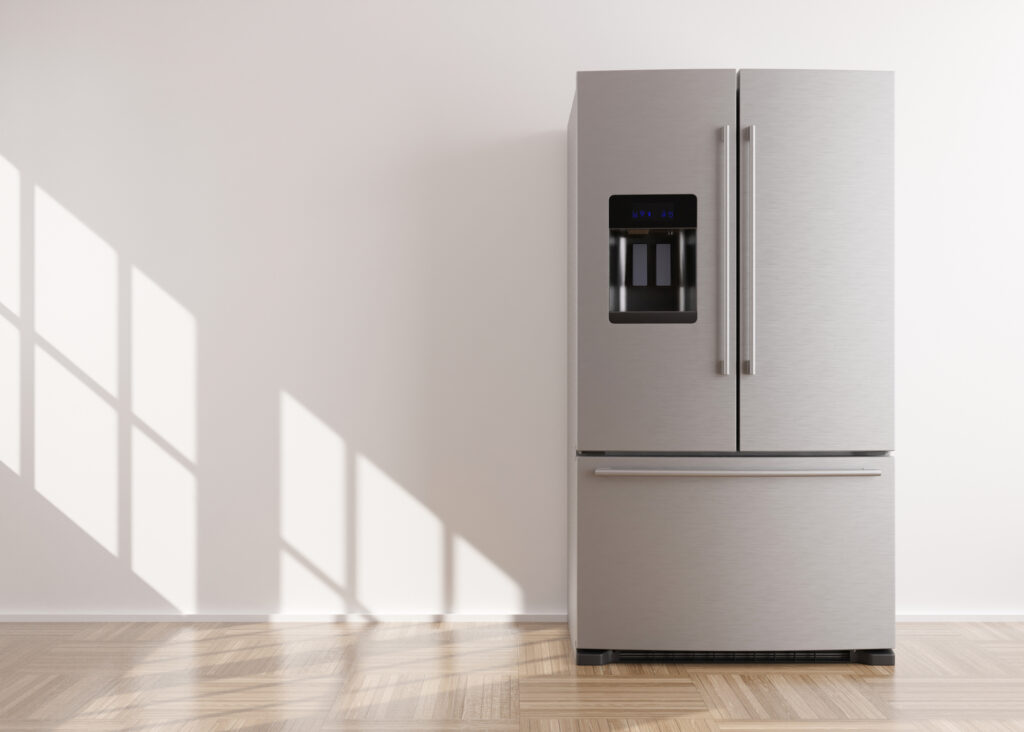 new stainless steel fridge with double doors and bottom drawer freezer.