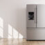 new stainless steel fridge with double doors and bottom drawer freezer.