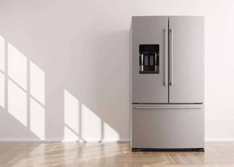 new stainless steel fridge with double doors and bottom drawer freezer.